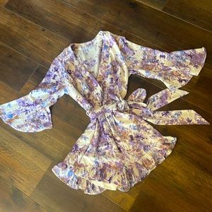 Lavender and white ruffle romper.